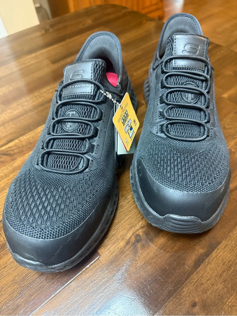 Skechers Men's Black Slip-On Work Shoes with composite toe size 10 wide